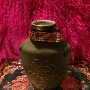 Tory Burch Fitbit holder bracelet.